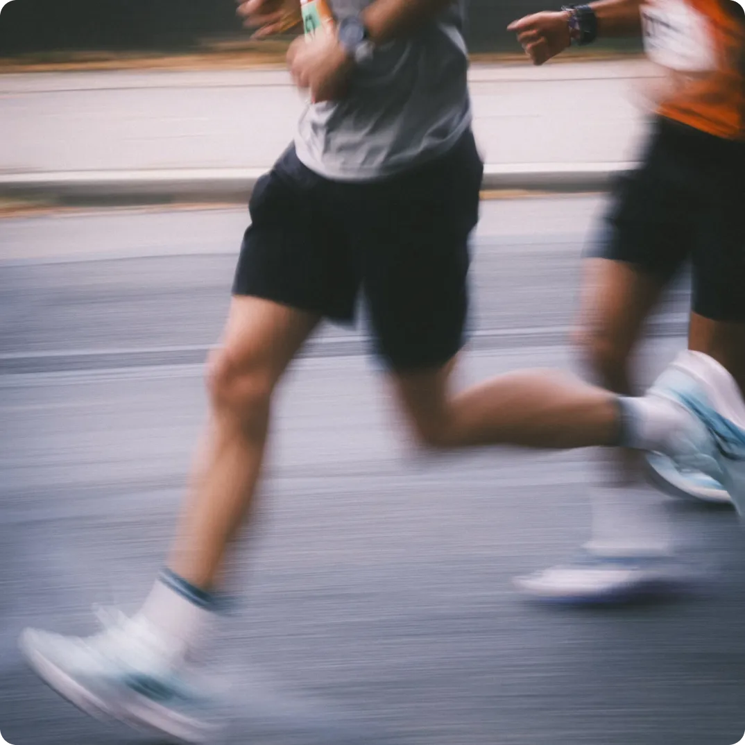 Runners mid-stride